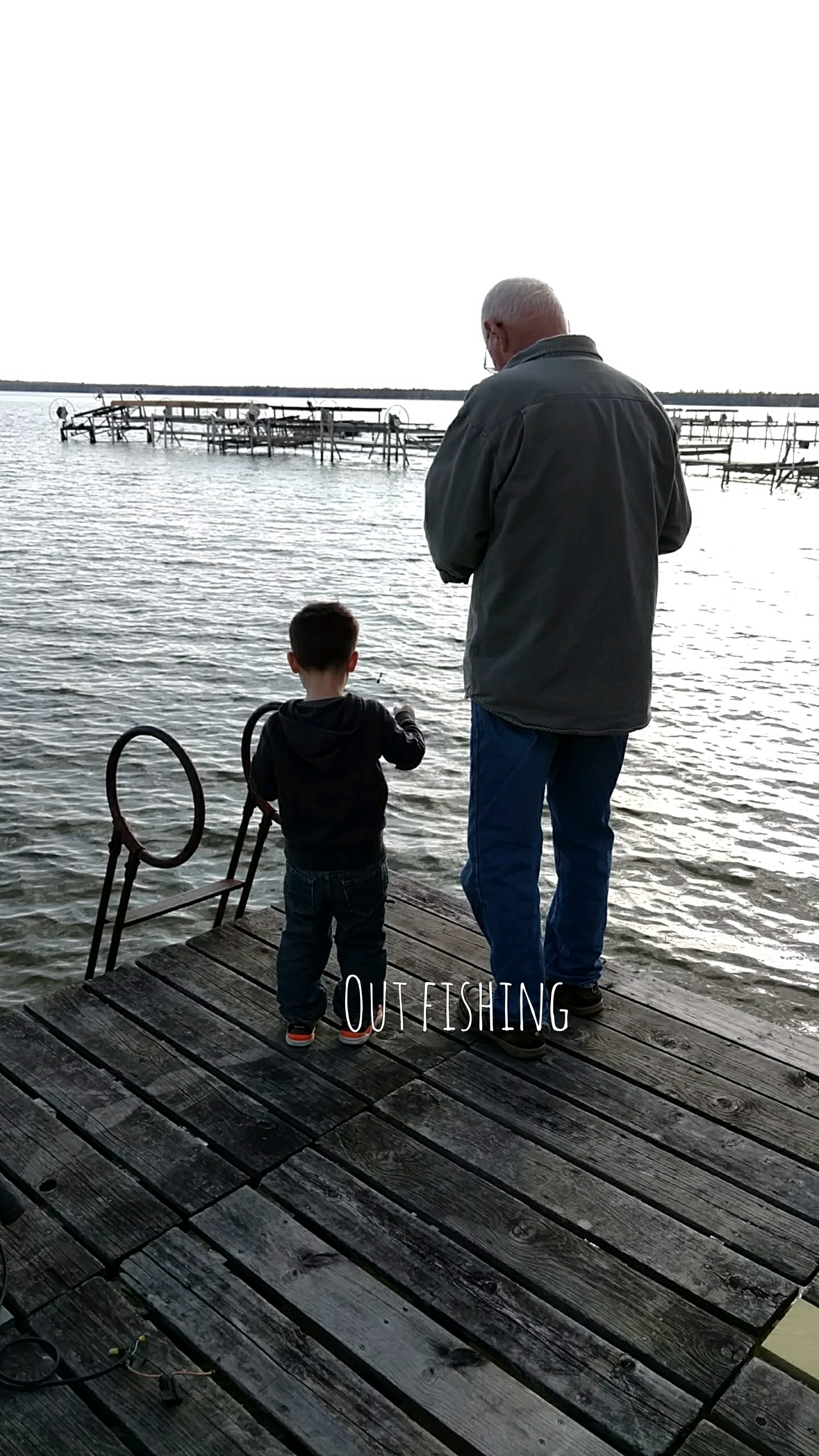Fishing off the dock on Houghton Lake Michigan