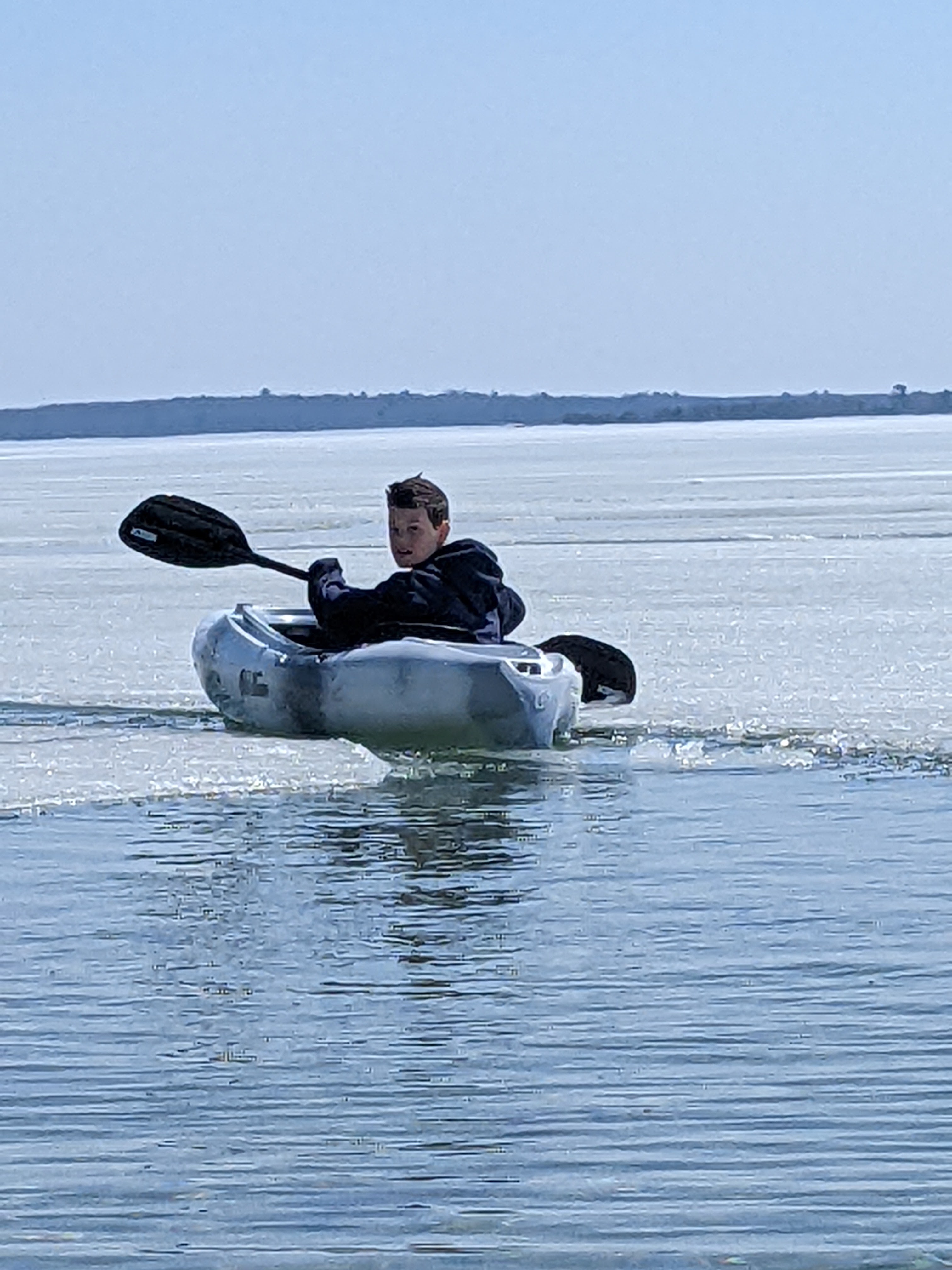 Kayaking on Higgins Lake Michigan in spring