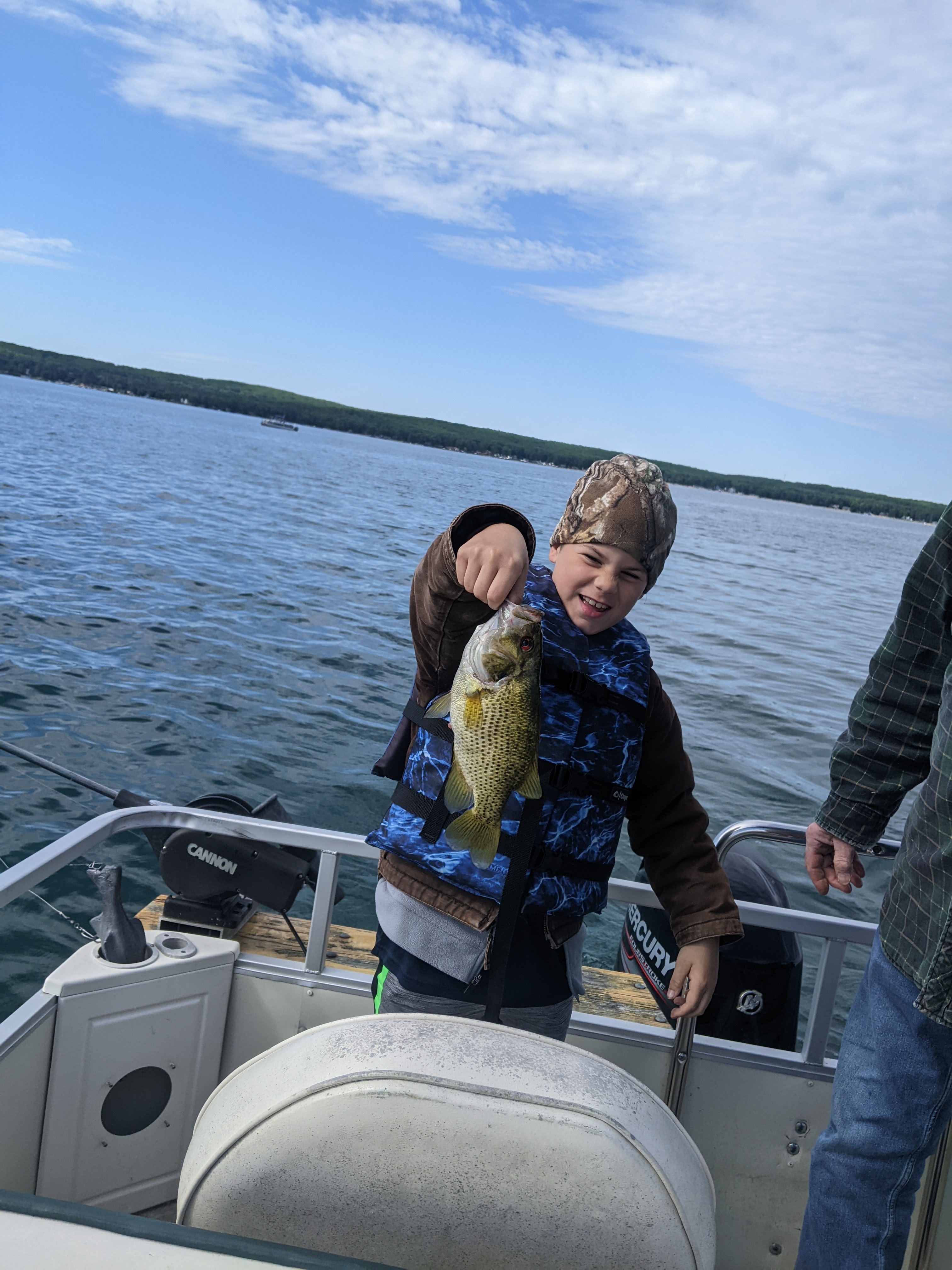 Fishing on the pontoon boat on Higgins Lake Michigan