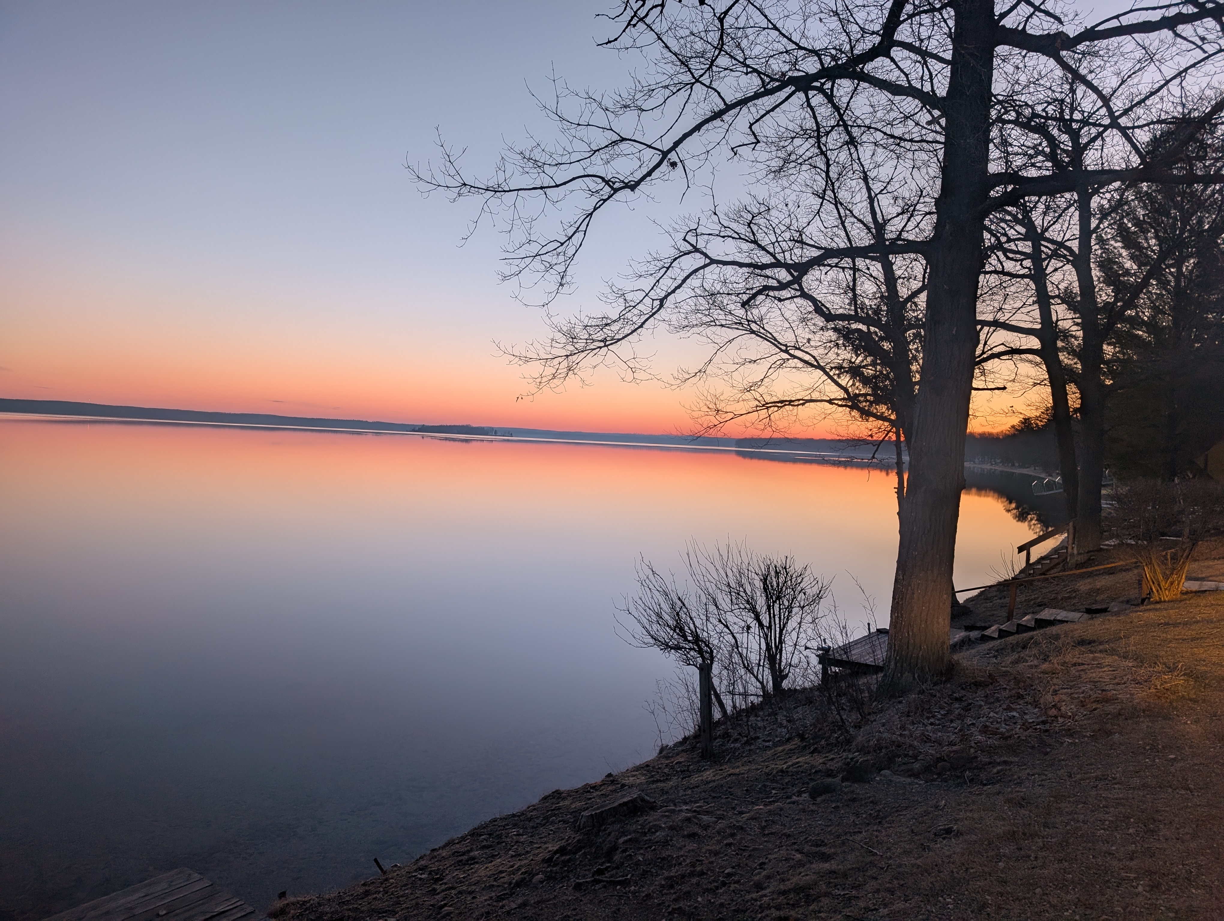 Winter sunset over frozen Houghton Lake Michigan